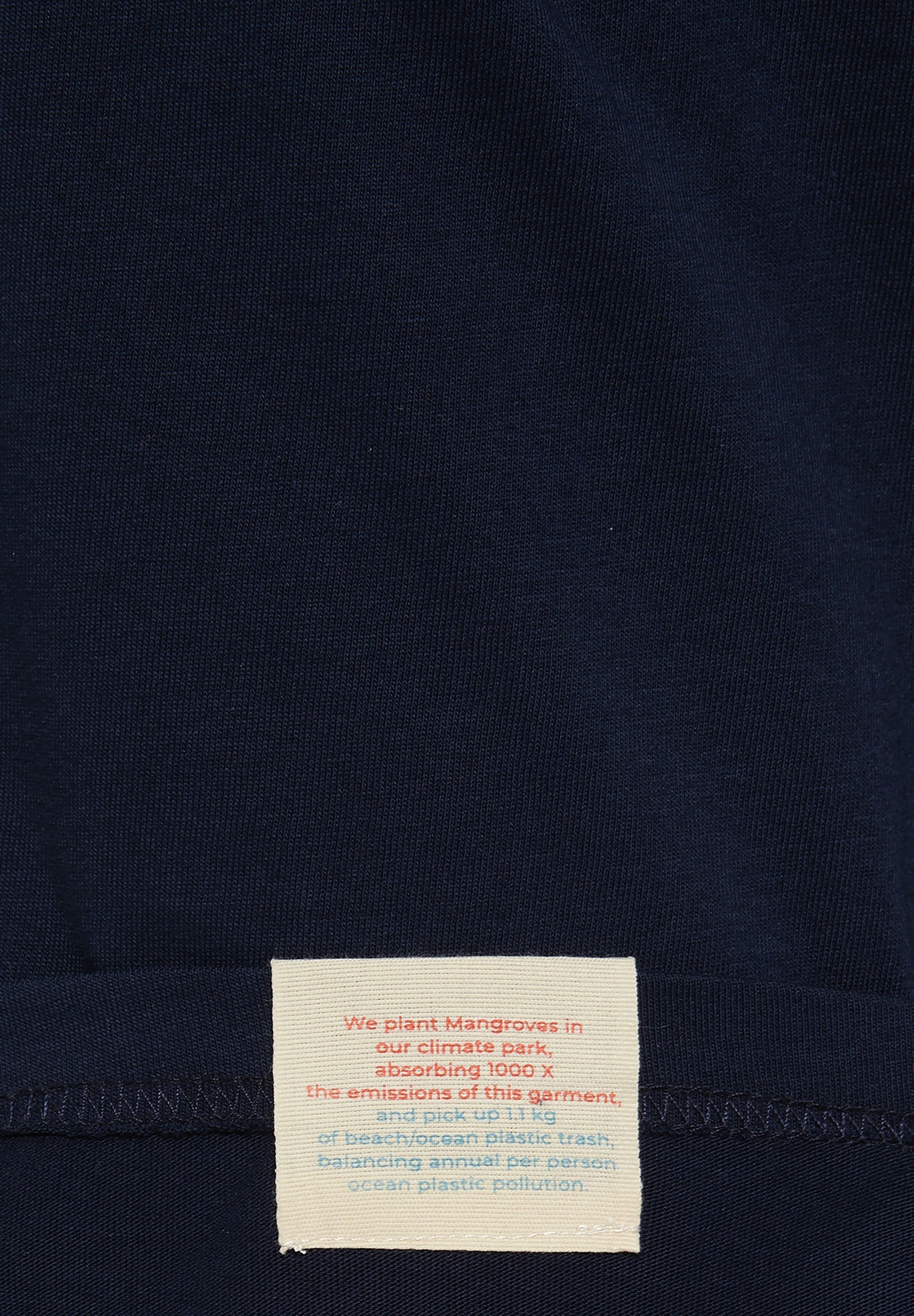 SURROUND TEE